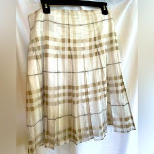 Burberry skirt. Lightweight with lining. White and tan plaid with pleats